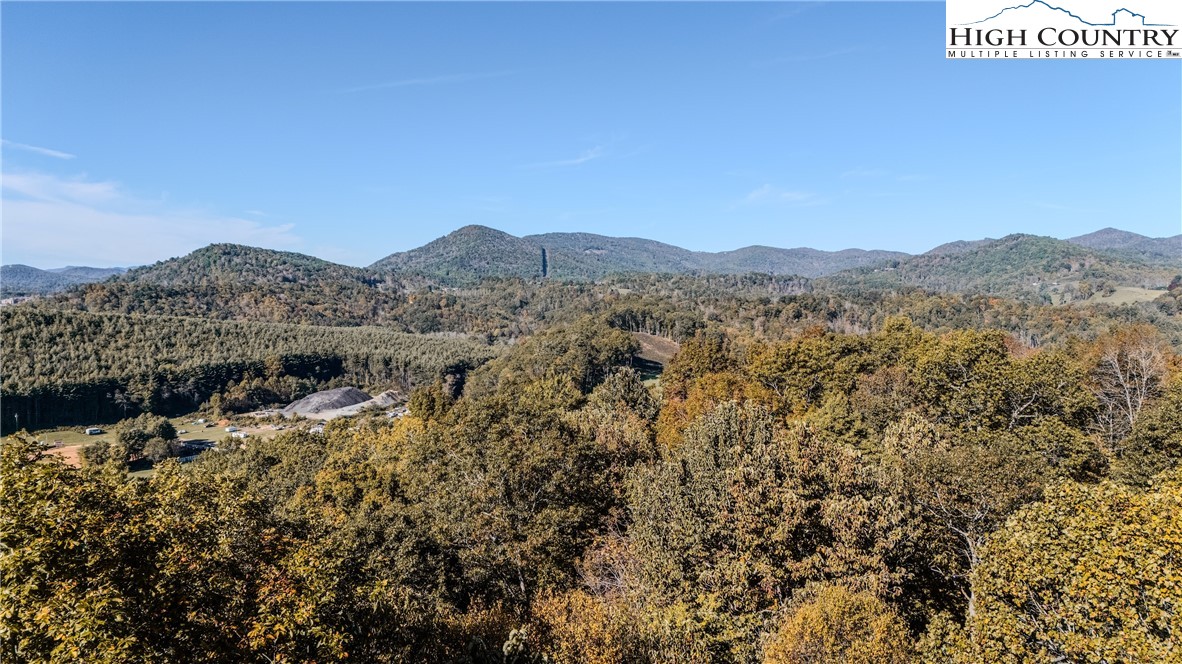 888 Benjamin Drive Boone, NC 28607 - Photo 38 of 38 a view of a house with a mountain in the background