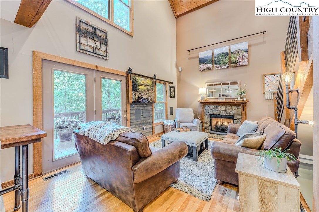 888 Benjamin Drive Boone, NC 28607 - Photo 5 of 38 a living room with furniture and a large window
