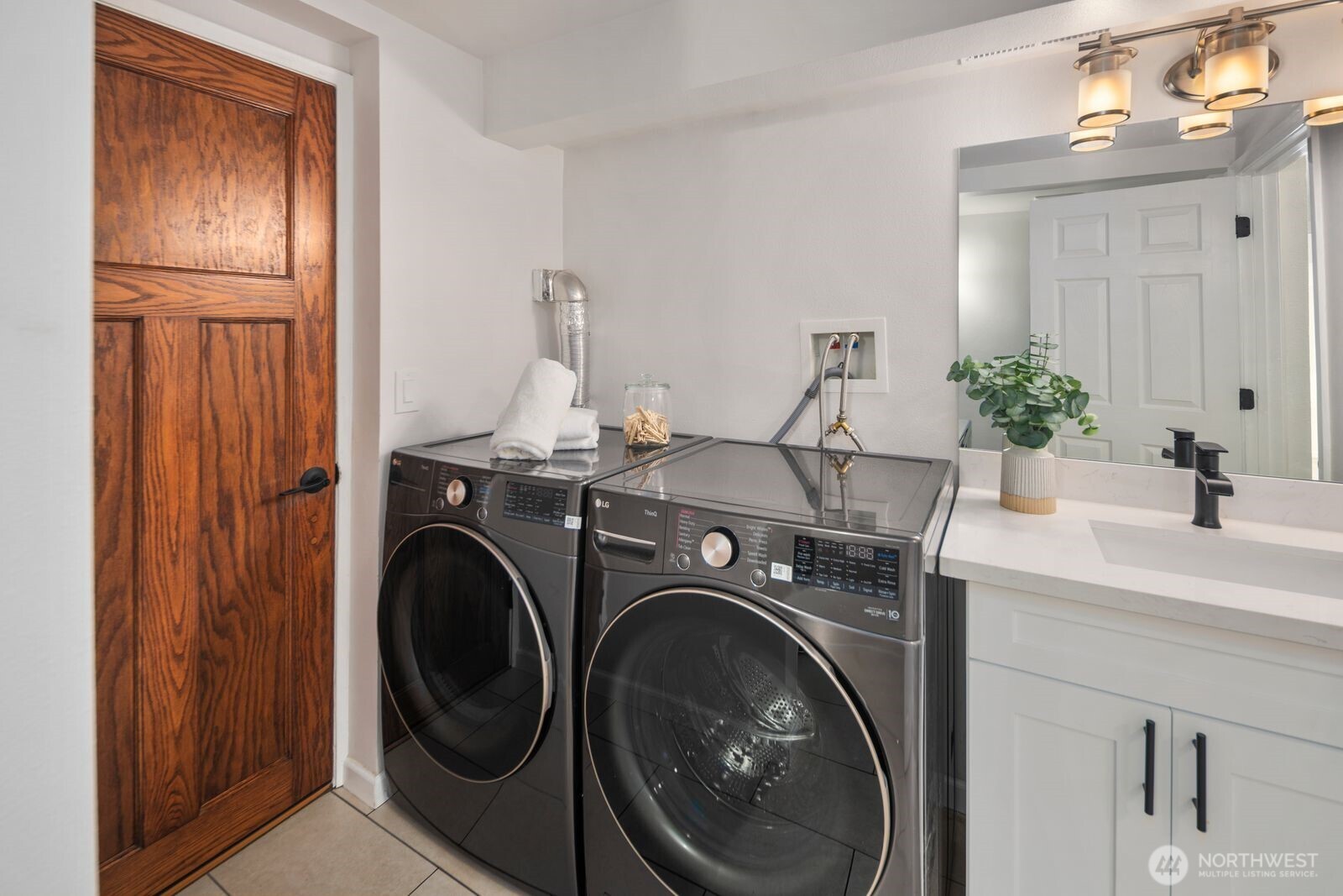4403 224th Place Southwest Mountlake Terrace, WA 98043 - Photo 14 of 32 a view of bathroom with washer and dryer