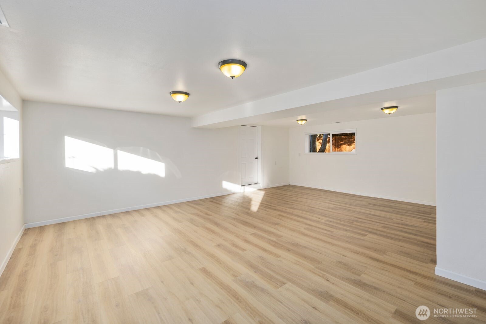 4403 224th Place Southwest Mountlake Terrace, WA 98043 - Photo 22 of 32 a view of empty room with wooden floor