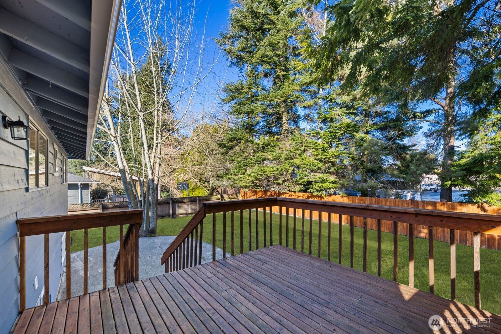 4403 224th Place Southwest Mountlake Terrace, WA 98043 - Photo 26 of 32 a view of a wooden roof deck