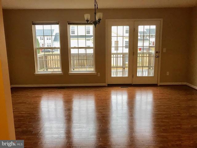 1231 Steed Street Ranson, WV 25438 - Photo 7 of 18 Enter the expansive deck through the French Doors.