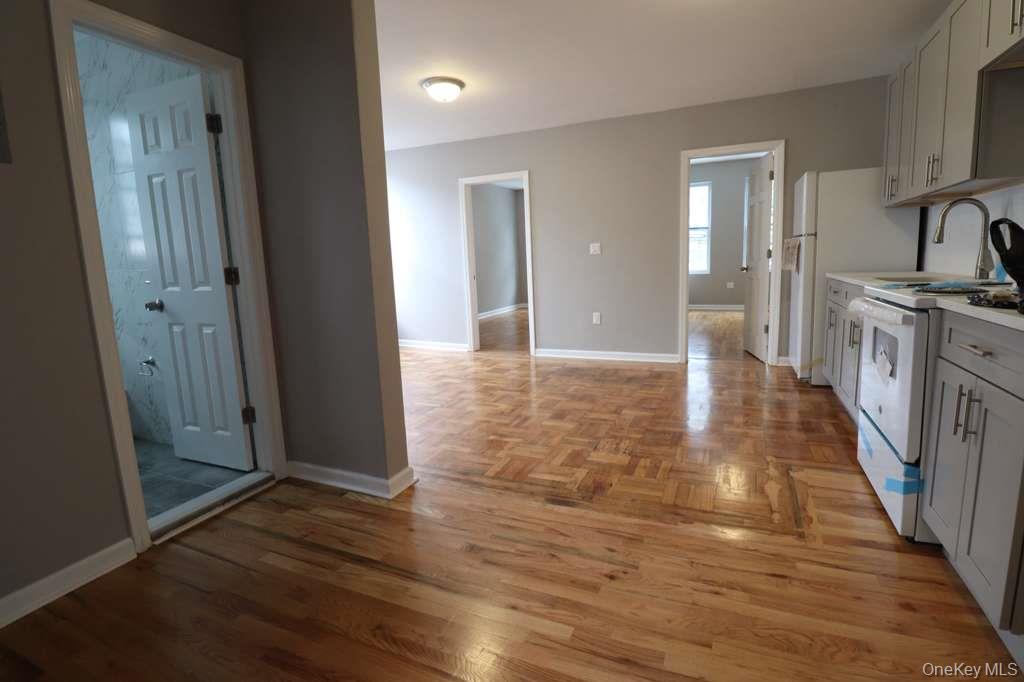 4432 Edson Avenue, Unit 1 Bronx, NY 10466 - Photo 2 of 4 a view of a kitchen from the hallway