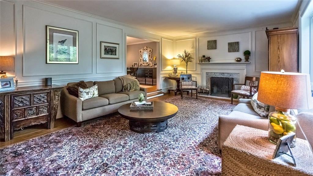 300 Wildberry Road Pittsburgh, PA 15238 - Photo 11 of 25 Living Room with Wainscoting and Fire Place.