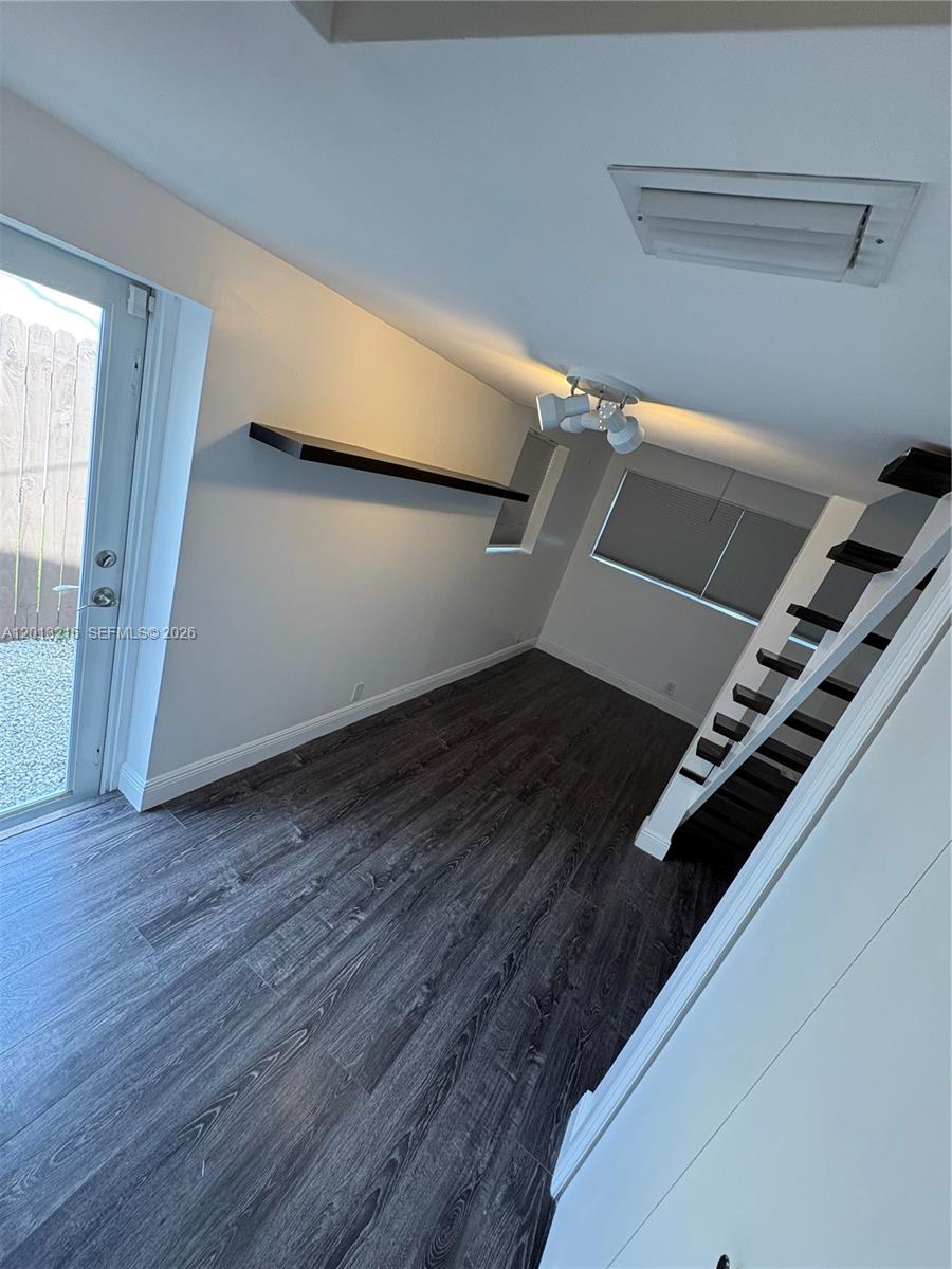 250 Southwest 19th Road Miami, FL 33129 - Photo 19 of 22 a view of a room with wooden floor