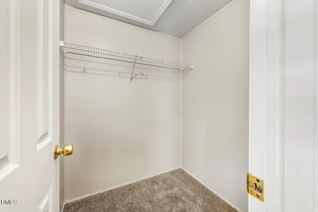 a view of small space with racks on the wall