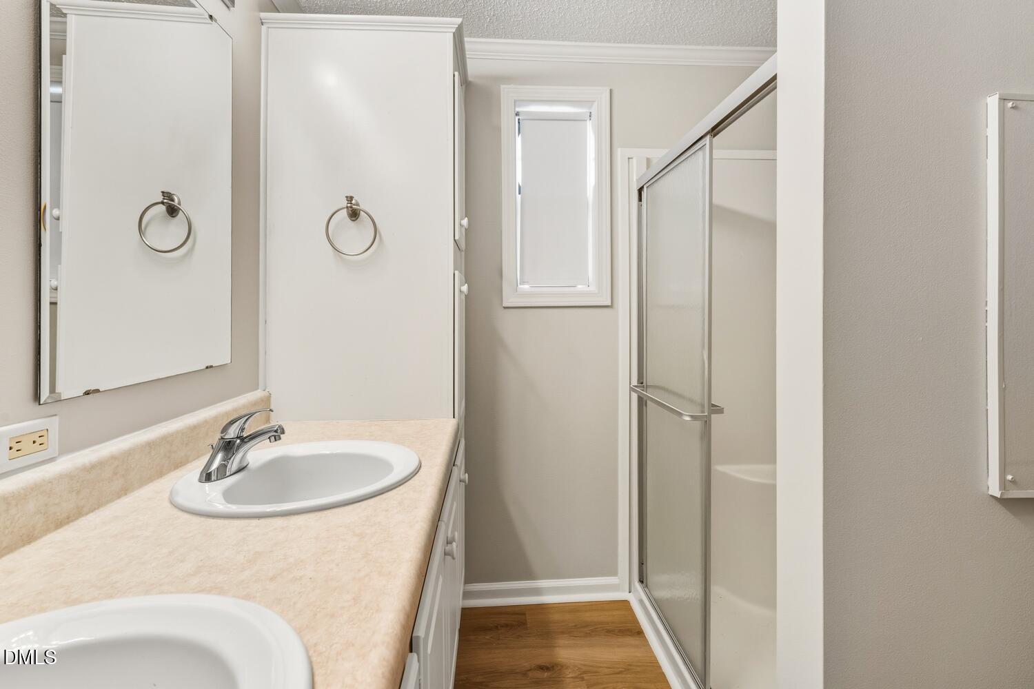 7555 Babe Ruth Trail Snow Camp, NC 27349 - Photo 19 of 38 a bathroom with a sink and a mirror