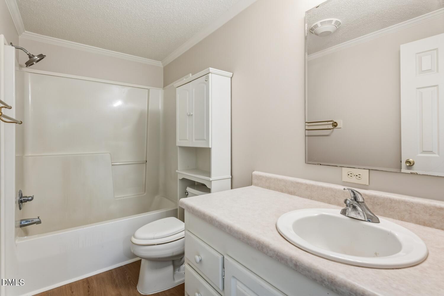 7555 Babe Ruth Trail Snow Camp, NC 27349 - Photo 22 of 38 a bathroom with a sink a toilet and shower