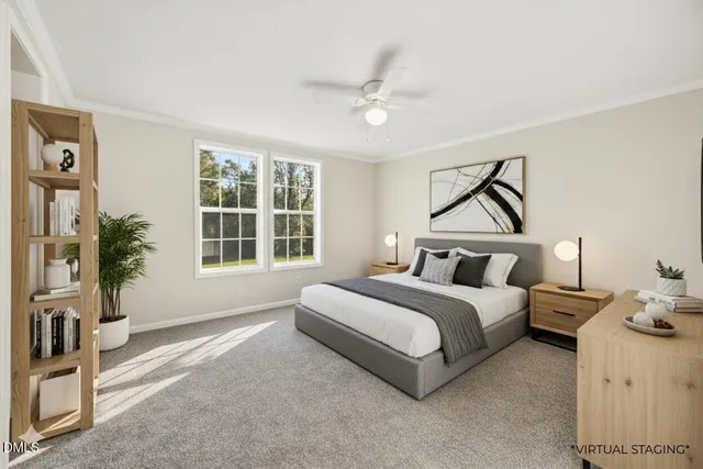 a spacious bedroom with a bed and a window