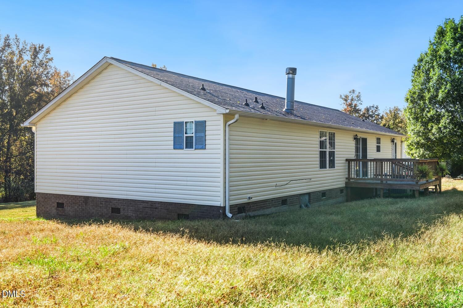 7555 Babe Ruth Trail Snow Camp, NC 27349 - Photo 30 of 38 a view of a house with a yard