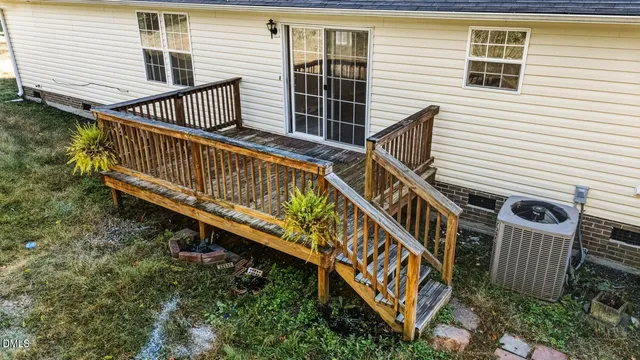 a view of balcony with deck and wooden floor