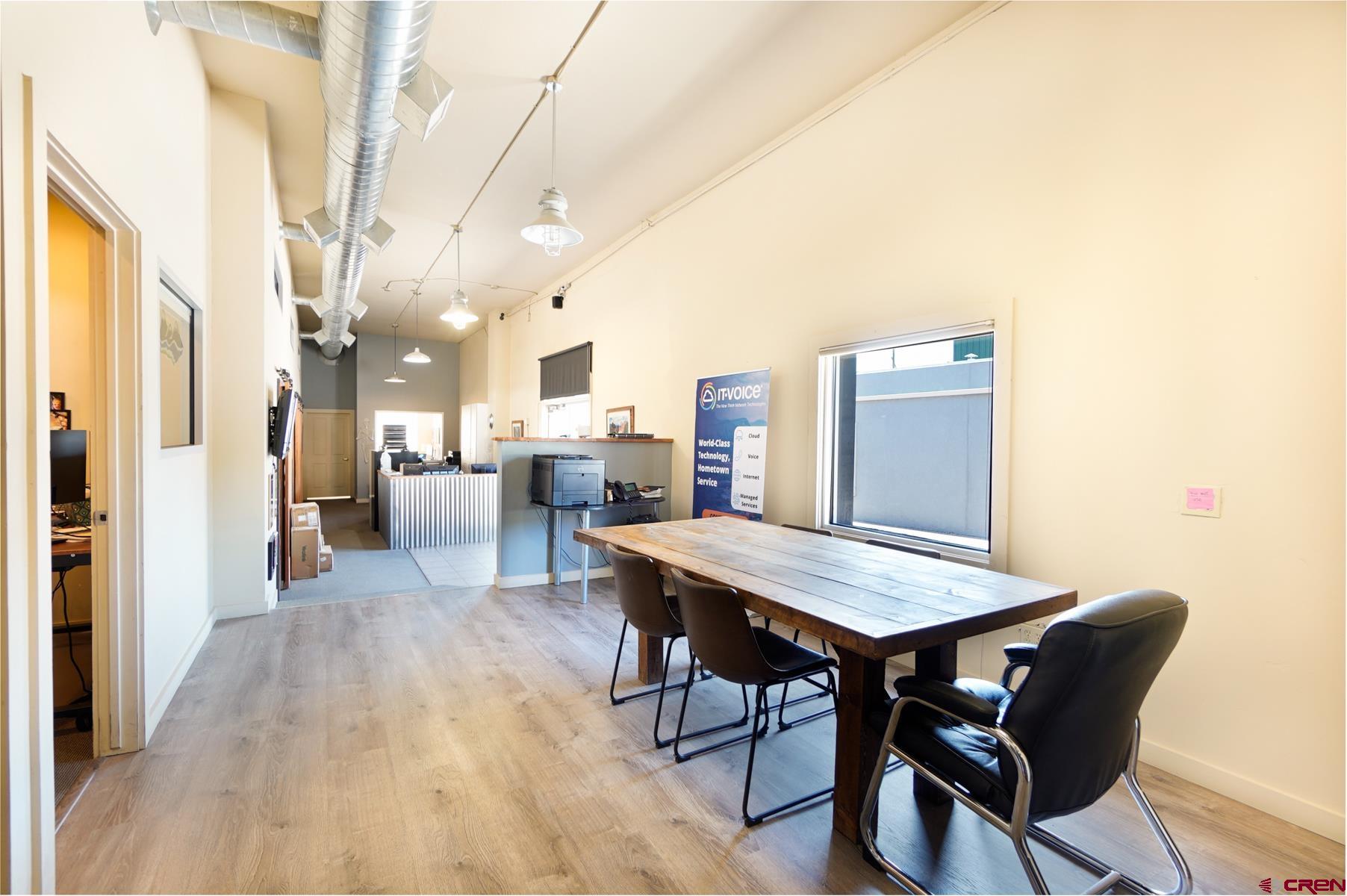 3067 Main Avenue Durango, CO 81301 - Photo 11 of 23 a view of a dining room with furniture and a table