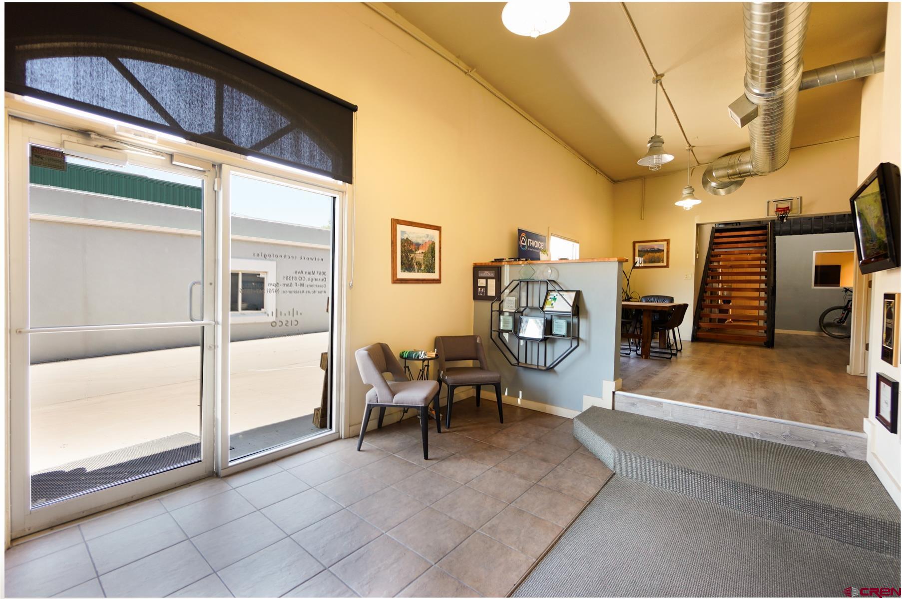 3067 Main Avenue Durango, CO 81301 - Photo 12 of 23 a view of a porch with furniture and a refrigerator
