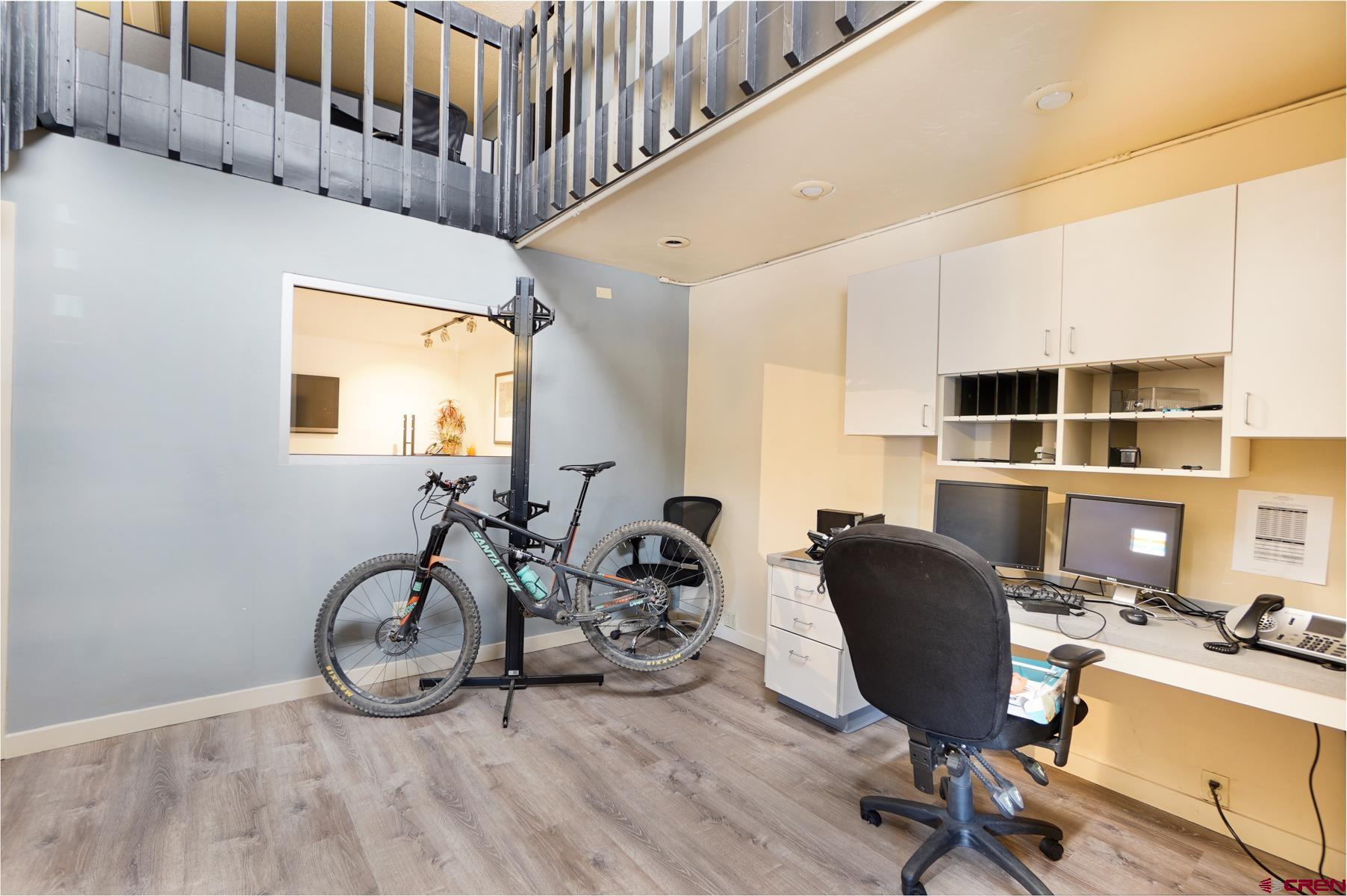 3067 Main Avenue Durango, CO 81301 - Photo 17 of 23 a view of a workspace with furniture and a window