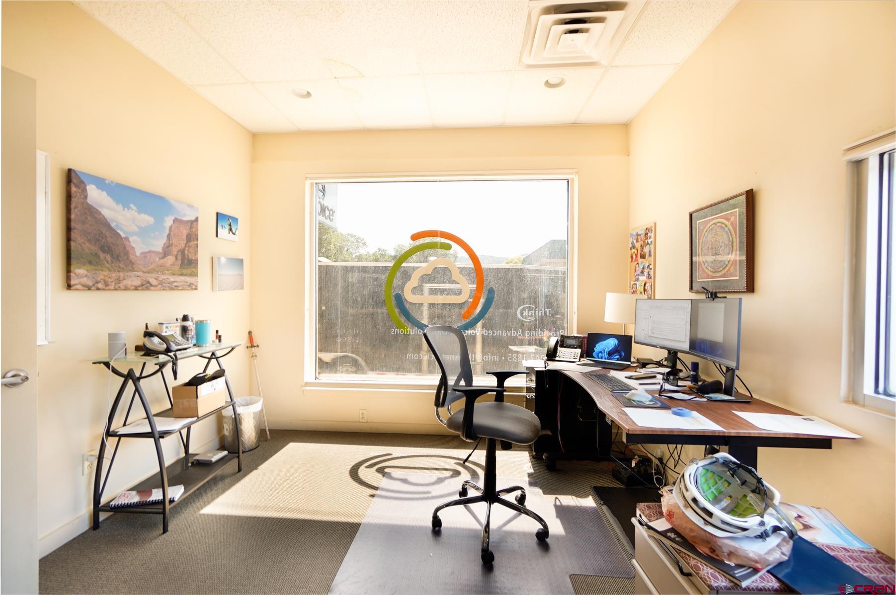 3067 Main Avenue Durango, CO 81301 - Photo 2 of 23 a view of a workspace with furniture
