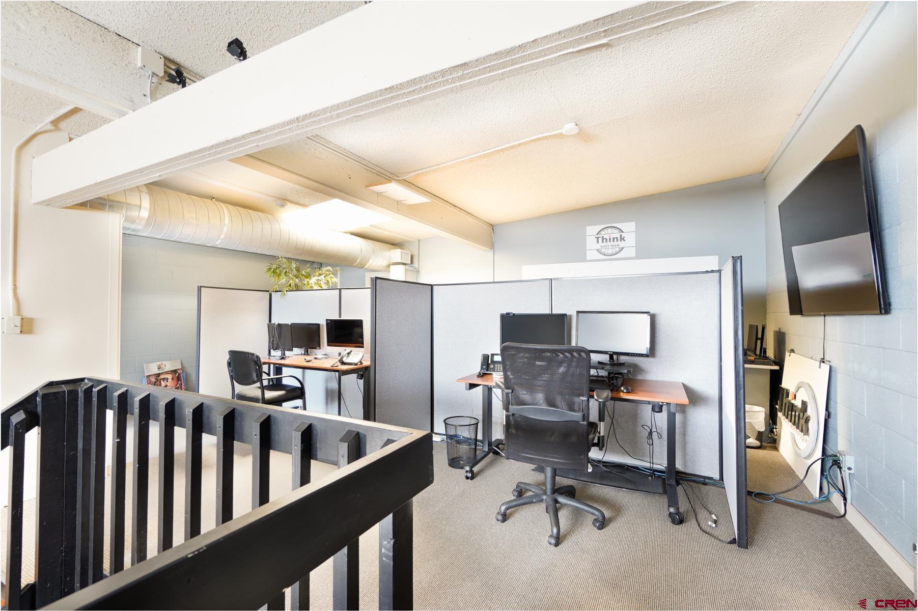 3067 Main Avenue Durango, CO 81301 - Photo 23 of 23 a view of a hallway with workspace and living room