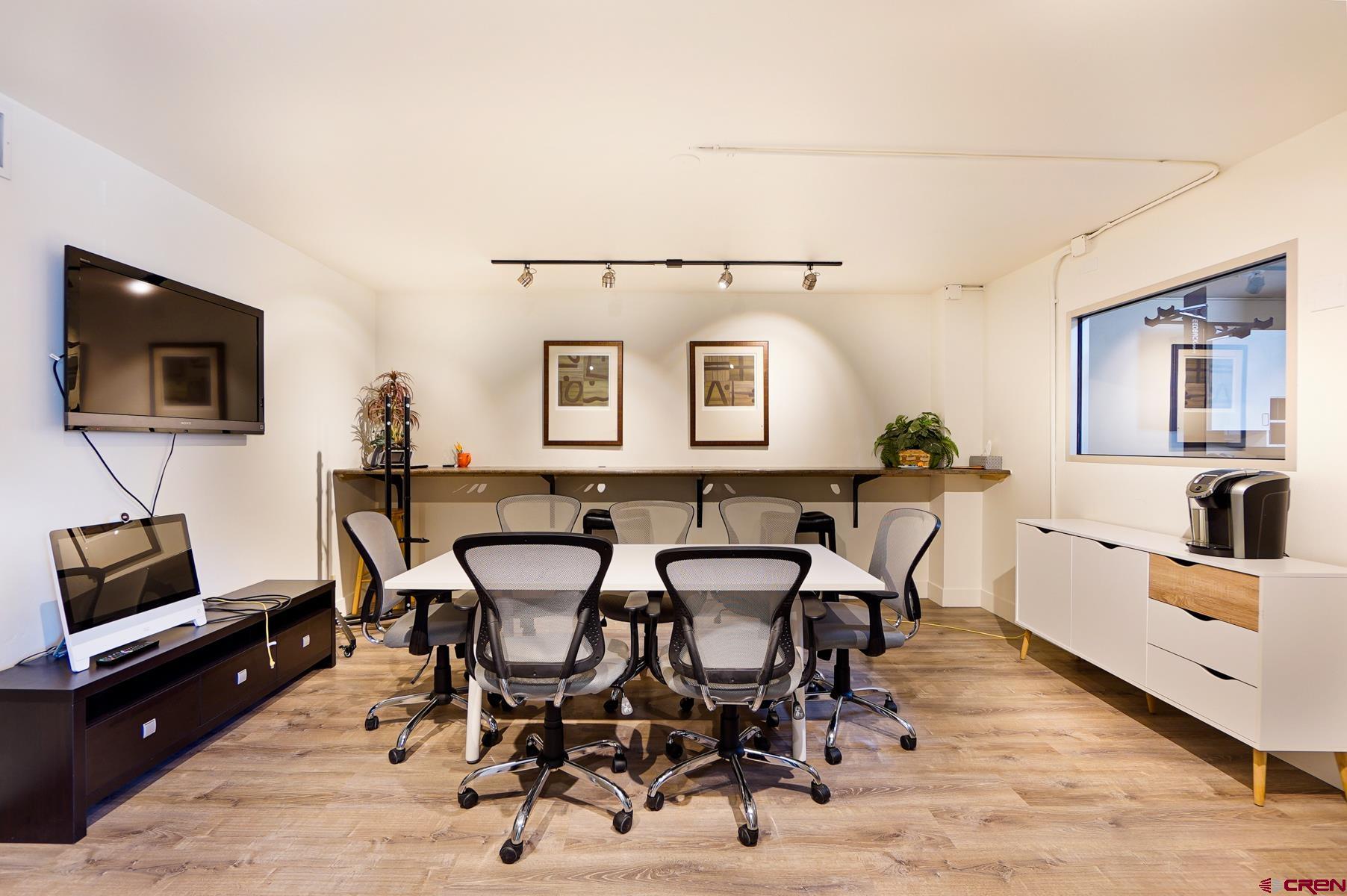 3067 Main Avenue Durango, CO 81301 - Photo 5 of 23 a view of a dining room with furniture and wooden floor