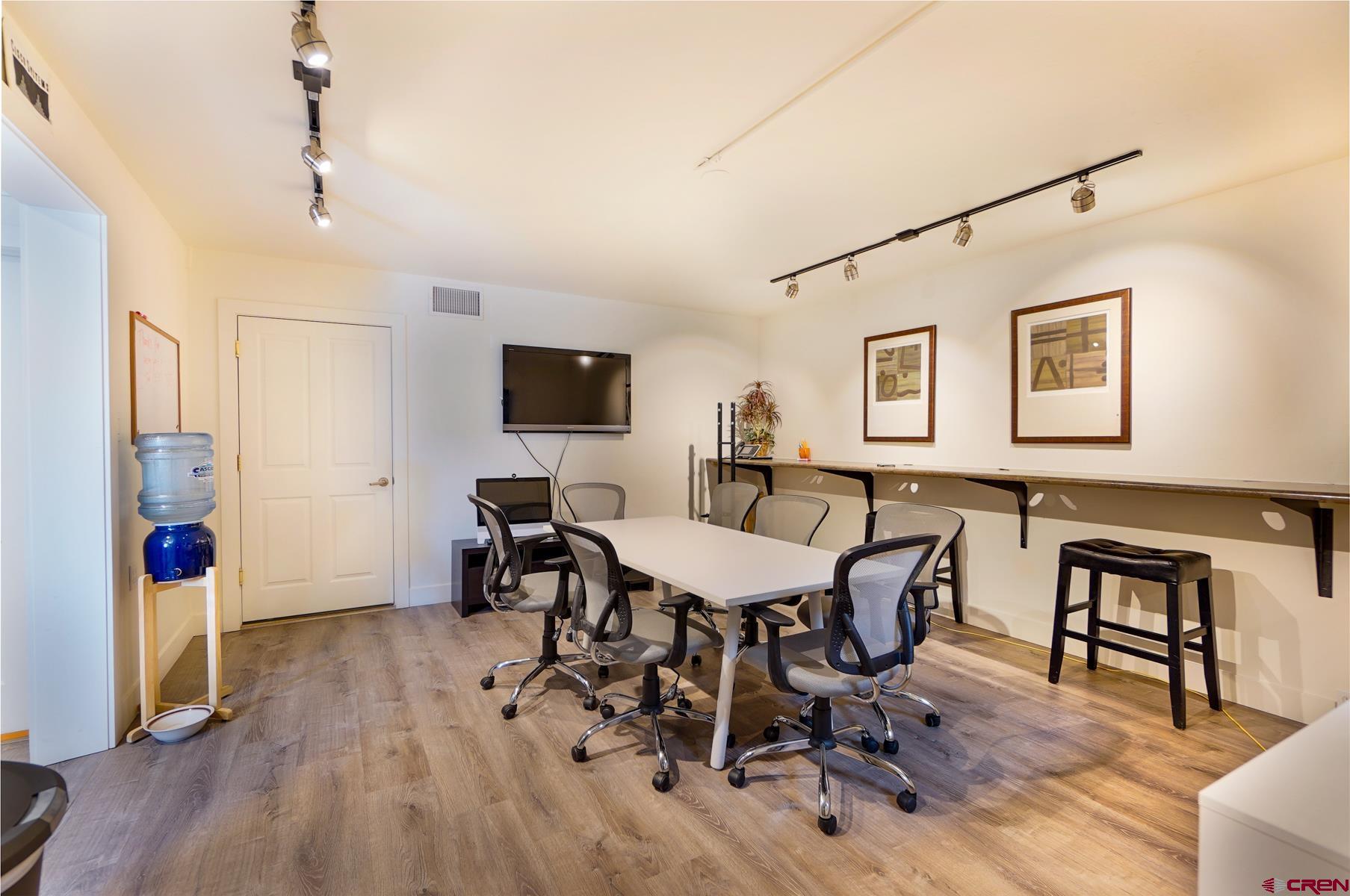 3067 Main Avenue Durango, CO 81301 - Photo 6 of 23 a view of a dining room with furniture and wooden floor