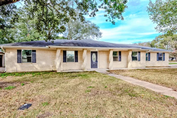 front view of a house with a dry yard