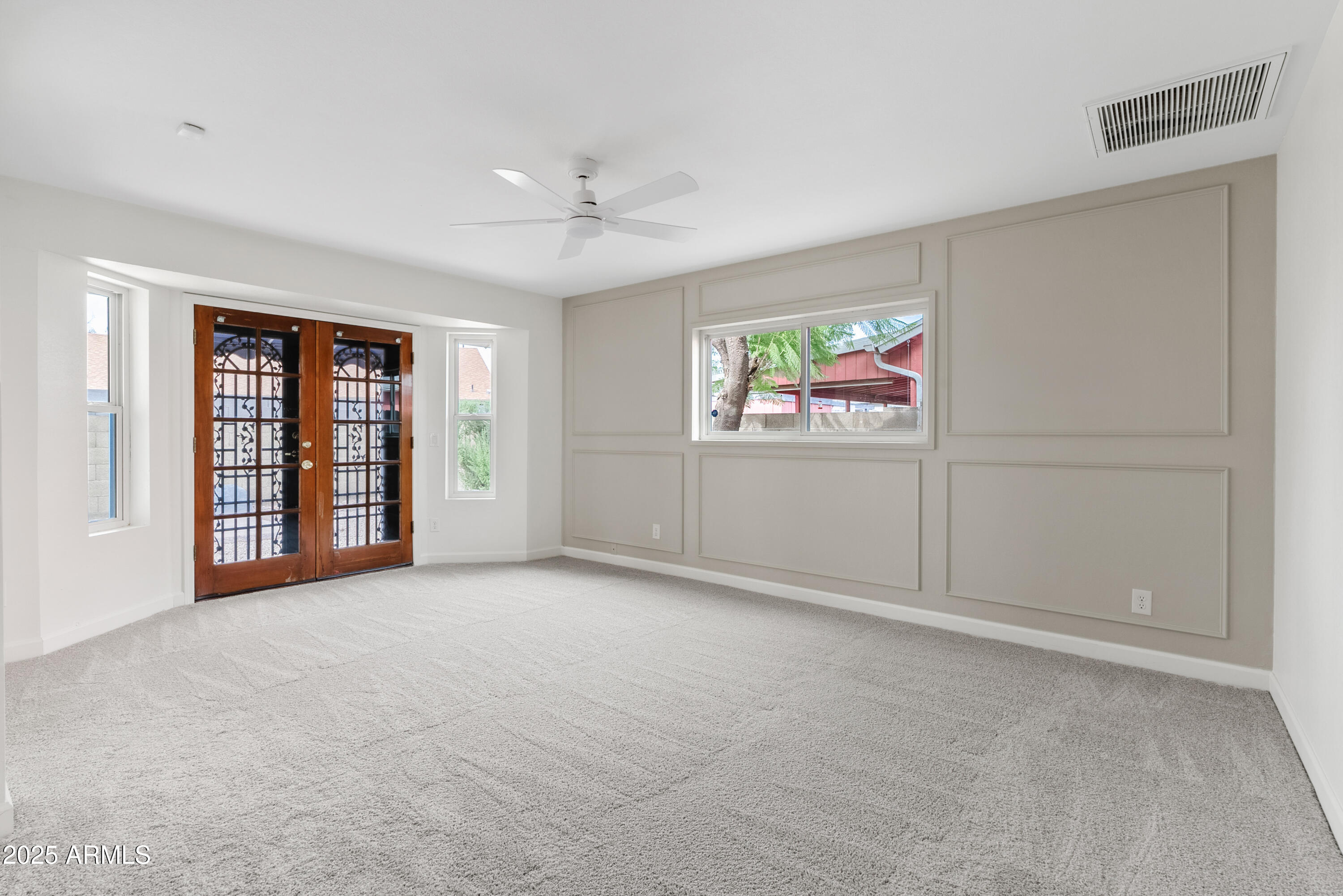 550 East Appaloosa Road Gilbert, AZ 85296 - Photo 19 of 41 a view of an empty room with a window