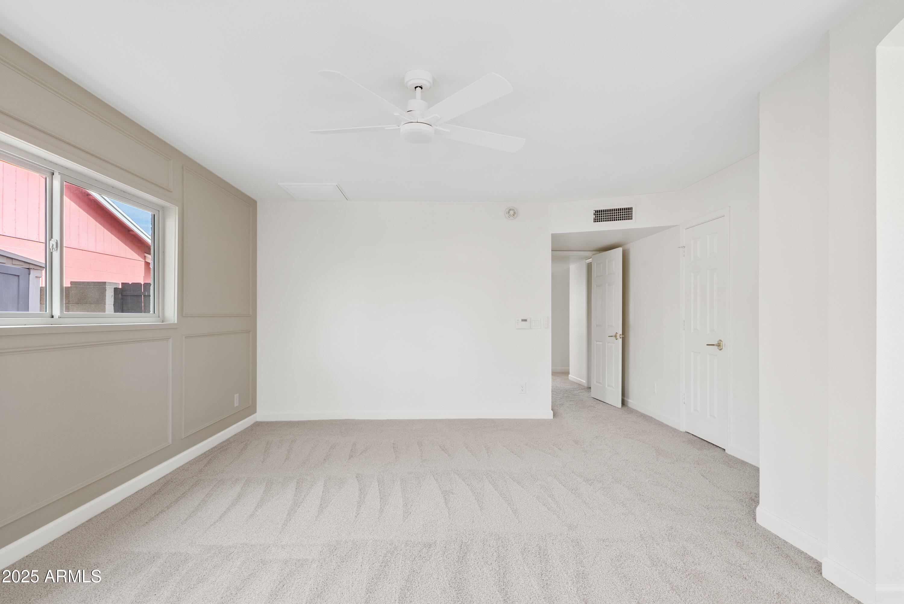 550 East Appaloosa Road Gilbert, AZ 85296 - Photo 21 of 41 a view of an empty room with a window