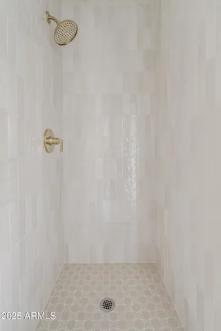 a white bath tub sitting next to a window