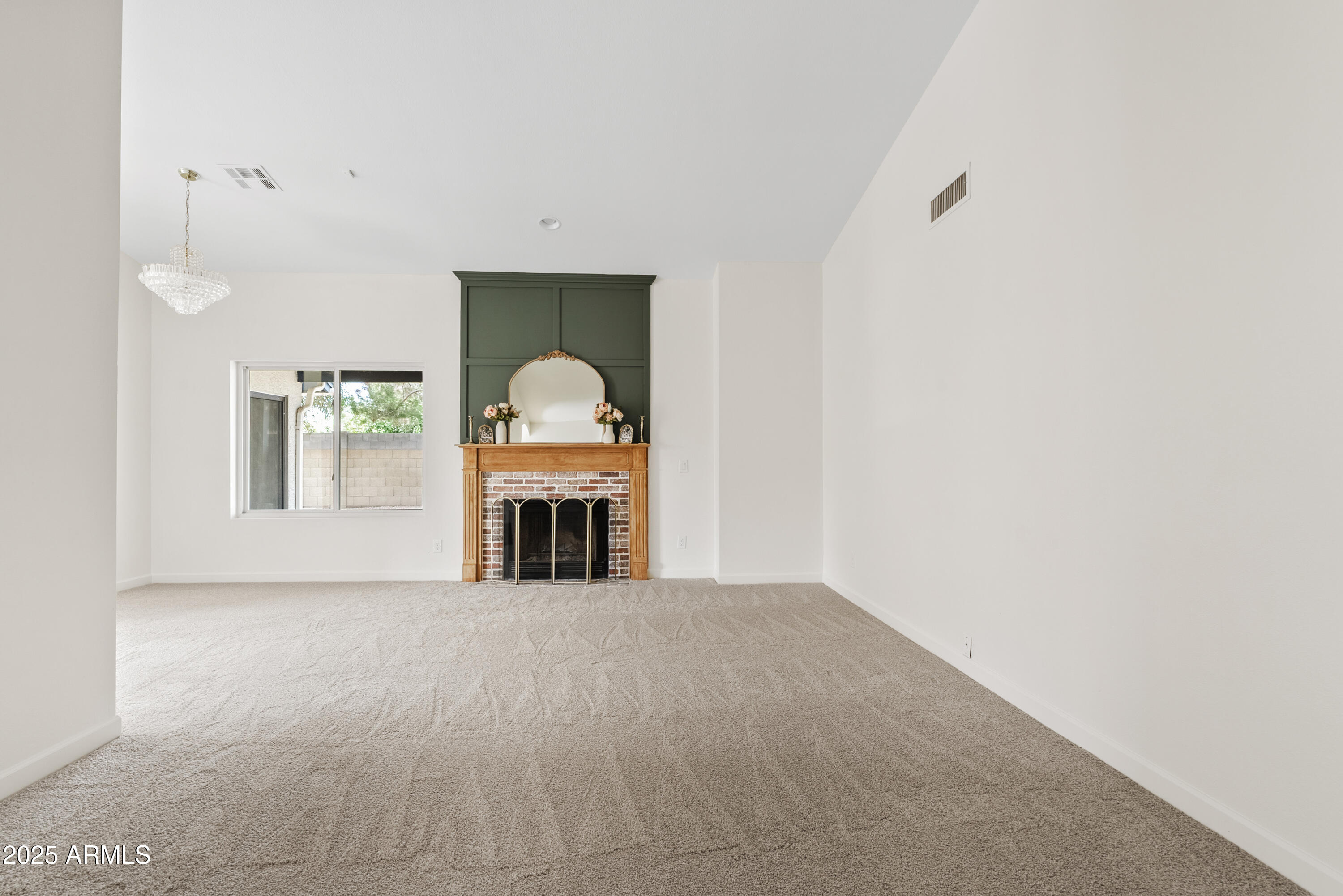 550 East Appaloosa Road Gilbert, AZ 85296 - Photo 2 of 41 a view of a livingroom with a fireplace