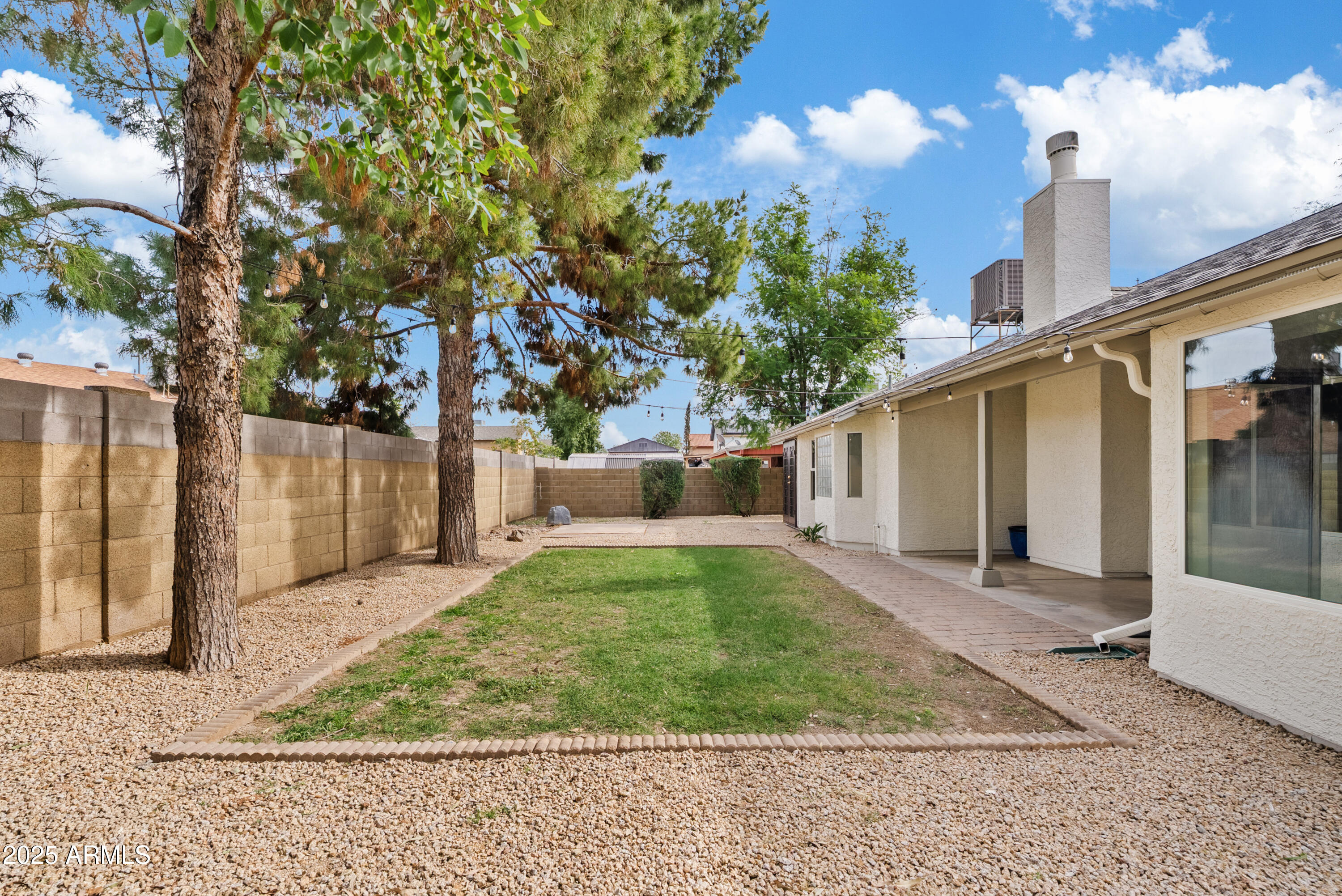 550 East Appaloosa Road Gilbert, AZ 85296 - Photo 35 of 41 a view of a house with backyard and sitting area