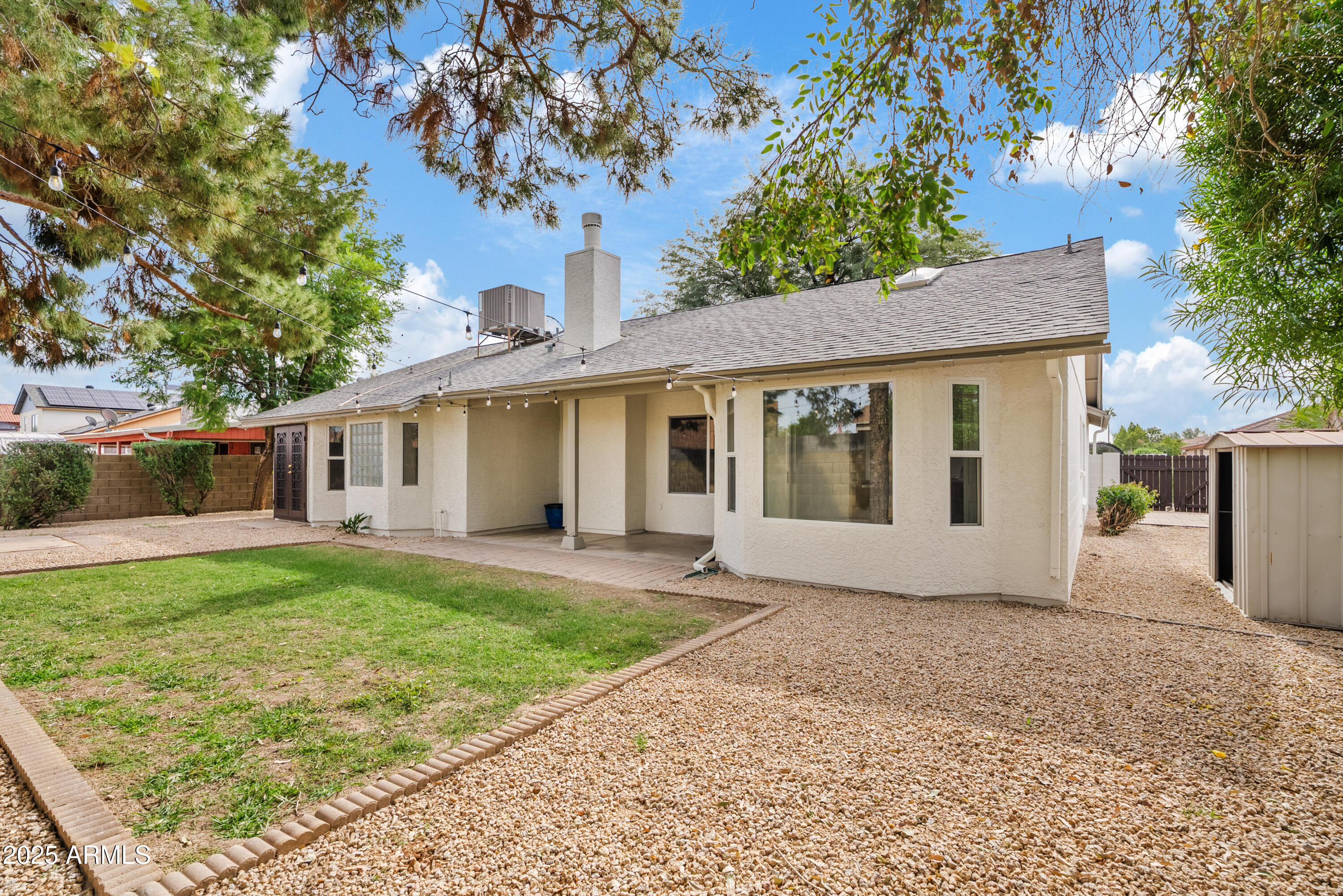550 East Appaloosa Road Gilbert, AZ 85296 - Photo 36 of 41 a front view of a house with a garden and yard