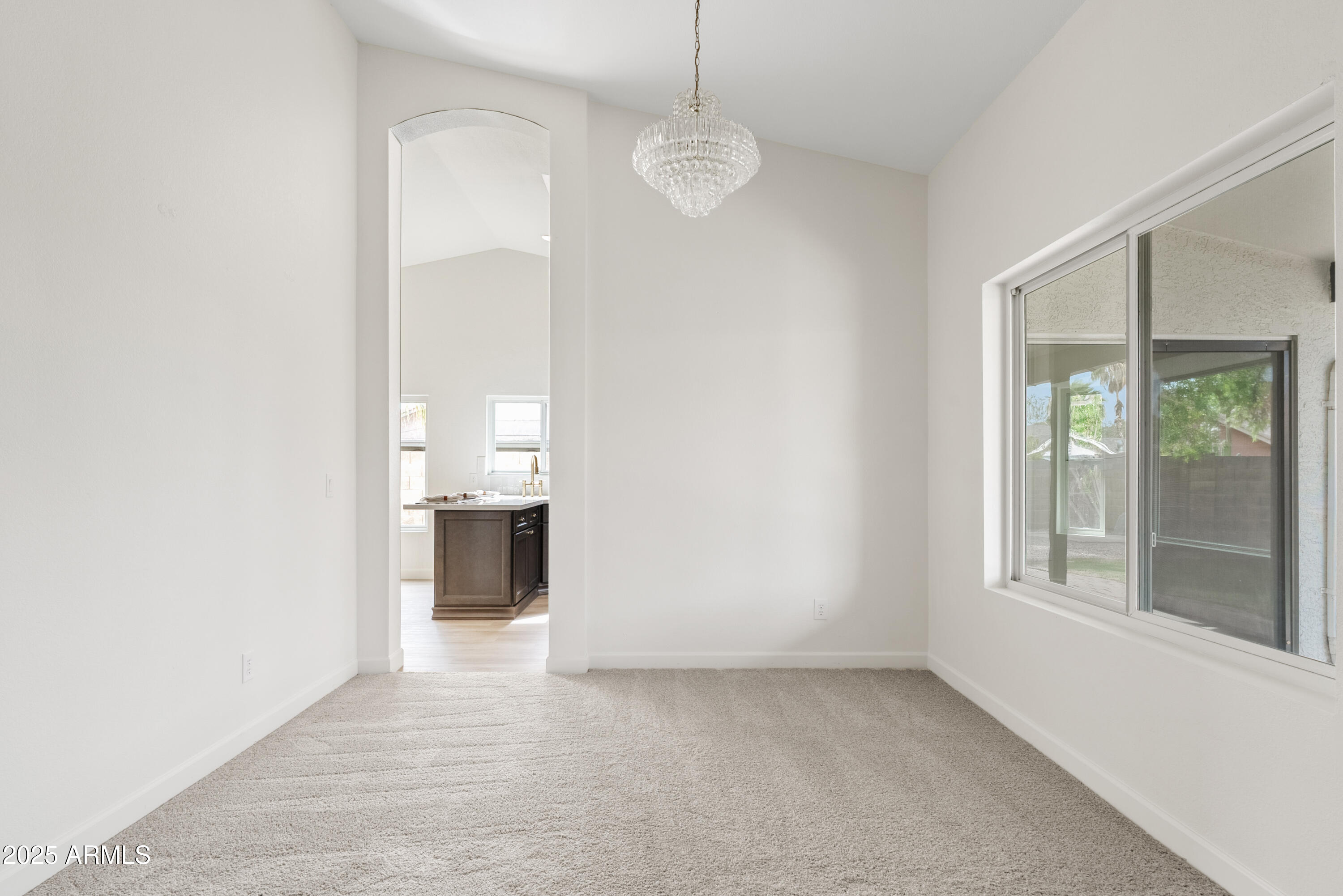 550 East Appaloosa Road Gilbert, AZ 85296 - Photo 7 of 41 a view of a room with a windows and a ceiling fan