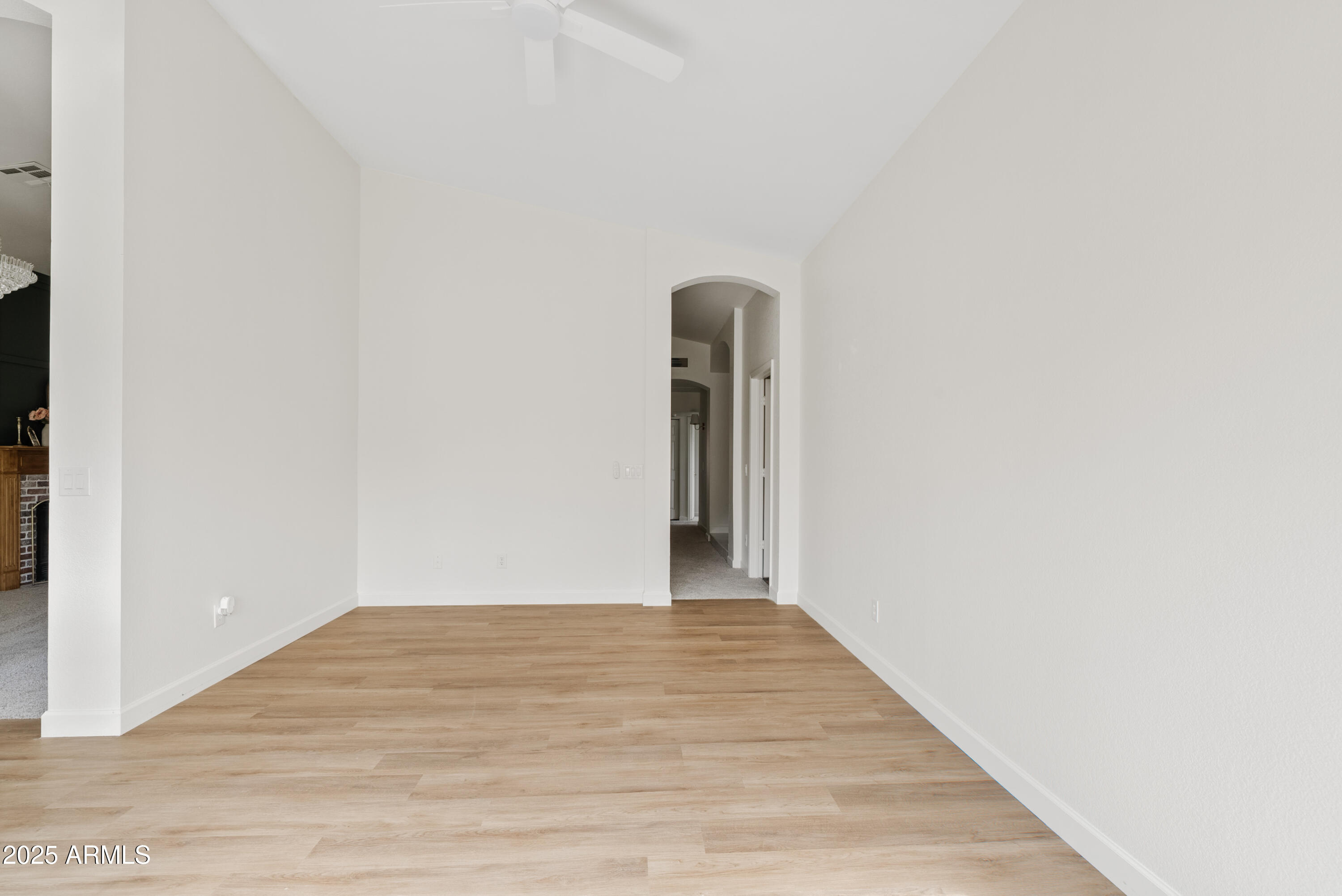 550 East Appaloosa Road Gilbert, AZ 85296 - Photo 8 of 41 a view of a room with wooden floor