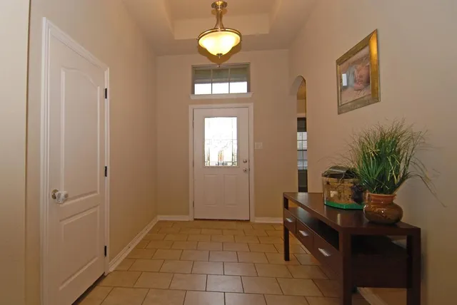 a view of a livingroom with furniture and window