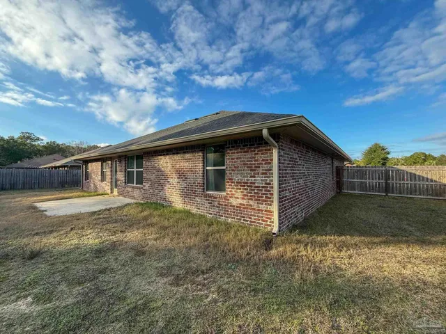 a view of backyard of house