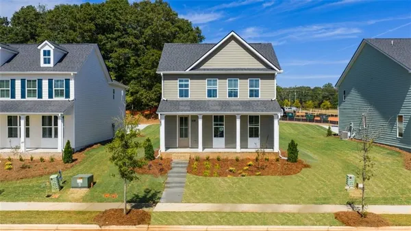 front view of a house with a yard