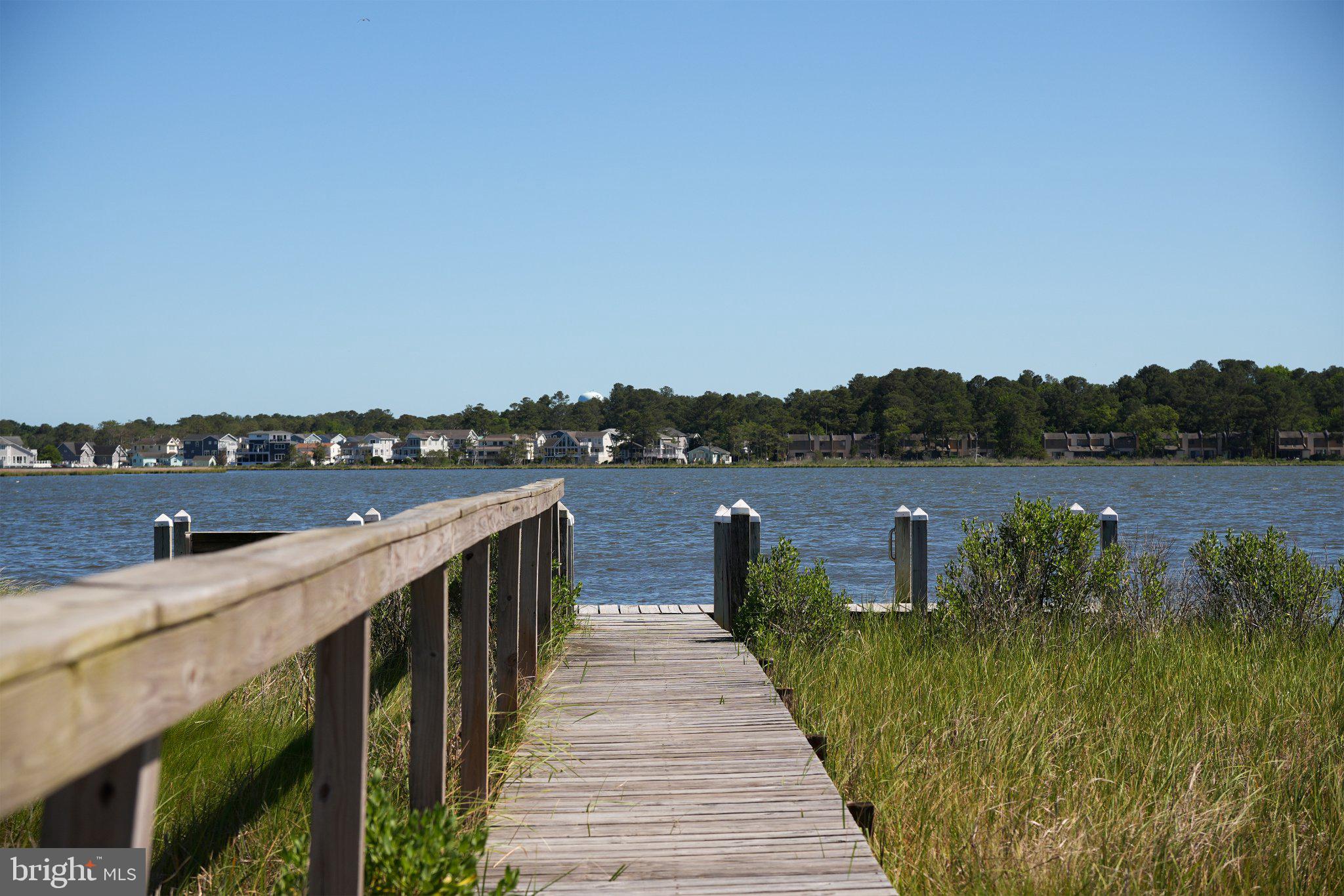402 Salt Pond Road Bethany Beach, DE 19930 - Photo 48 of 55 Serene waterfront pathway awaits you.