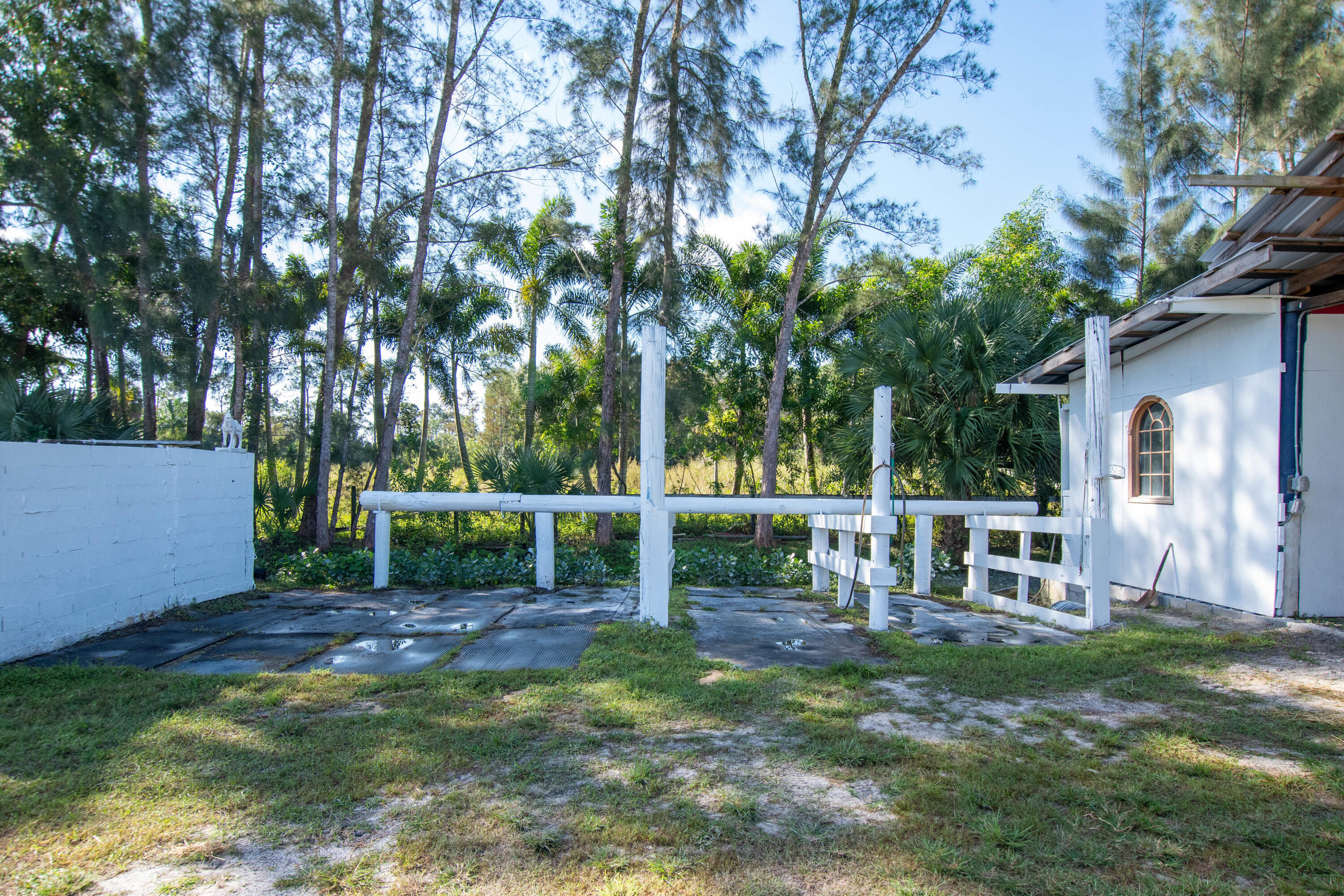 1044 D Road Loxahatchee Groves, FL 33470 - Photo 28 of 36 a view of house with a backyard