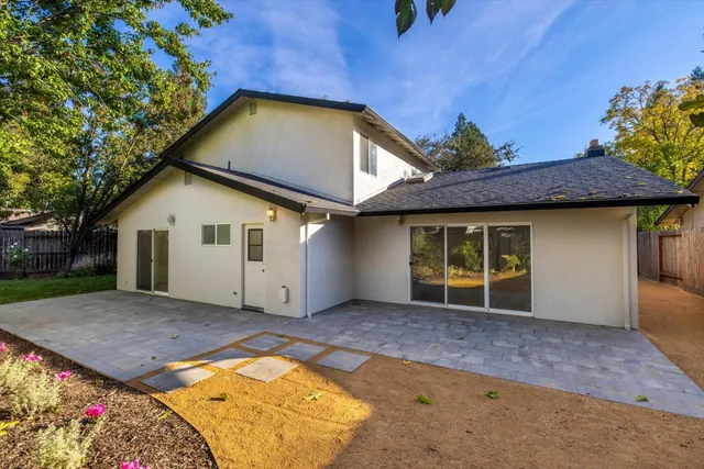 a bathroom with a sink a mirror and vanity