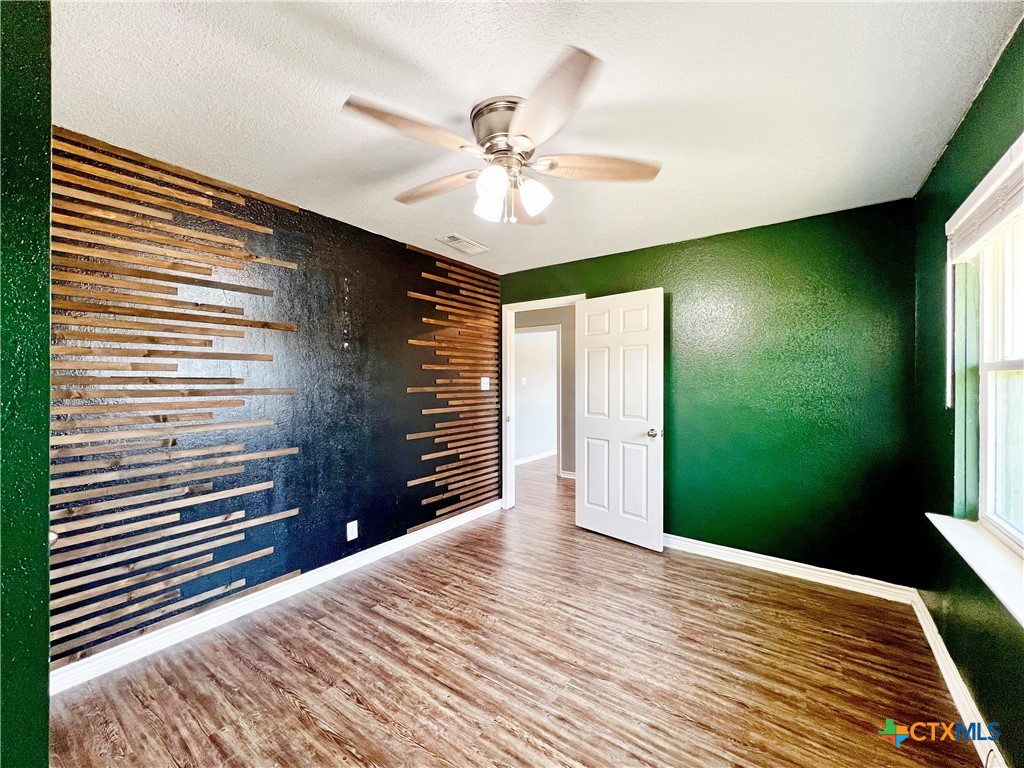 1311 West Main Street Gatesville, TX 76528 - Photo 14 of 30 a view of a livingroom with a chandelier