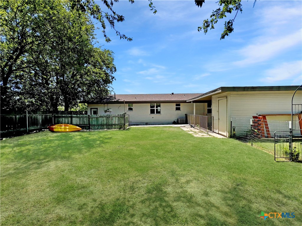 1311 West Main Street Gatesville, TX 76528 - Photo 30 of 30 a view of a house with a backyard