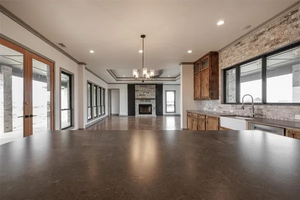 a view of a lobby with furniture and floor to ceiling window