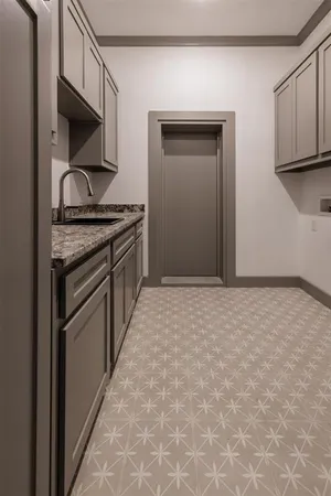a kitchen with stainless steel appliances granite countertop a stove and a microwave