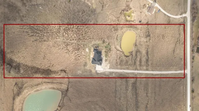 a bathroom with a shower and a sink