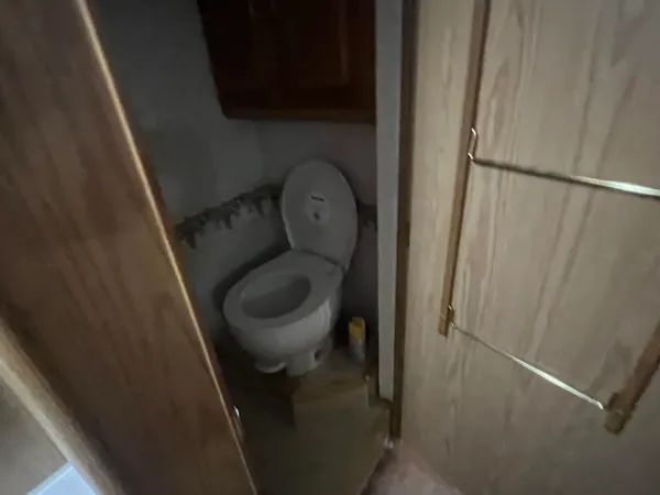 a bathroom with a toilet and a sink
