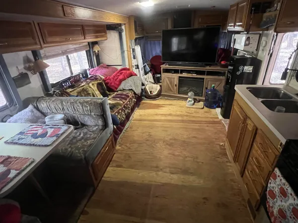 a living room with a couch and a flat screen tv