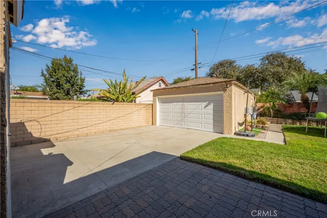 a view of a house with a garden