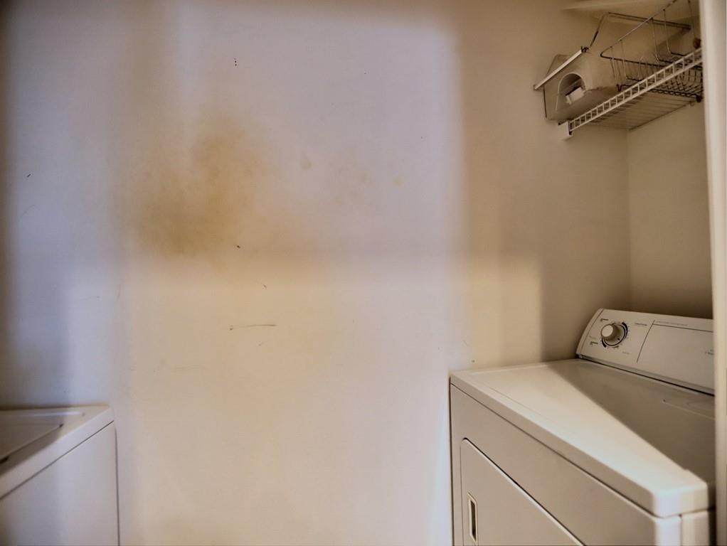 3636 Habersham Road Northwest, Unit 2308 Atlanta, GA 30305 - Photo 23 of 42 a utility room with dryer and washer