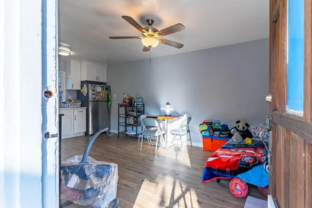 a workspace with furniture and wooden floor