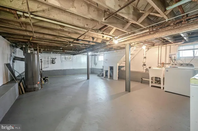 a view of a street with a building in the background