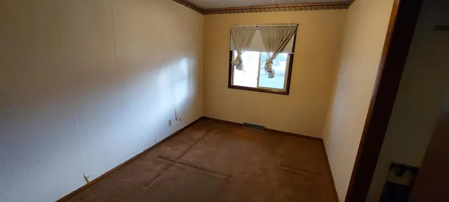 a view of an entryway with a window