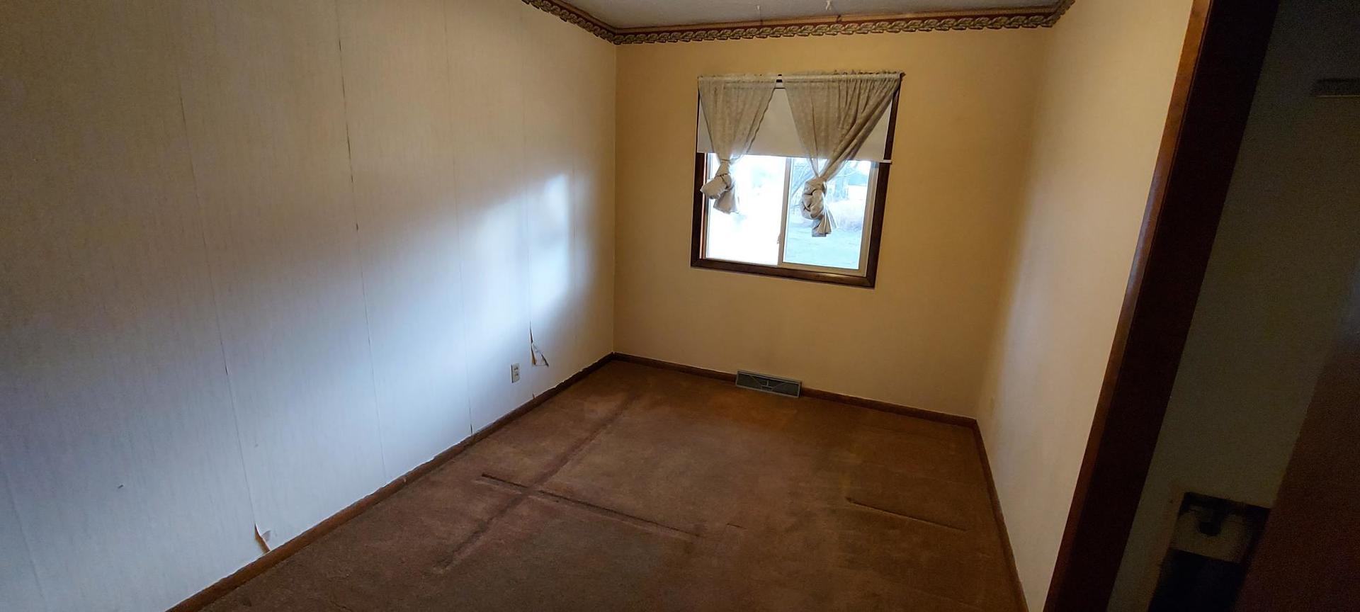 1606 20th Avenue Viola, IL 61486 - Photo 16 of 26 a view of an entryway with a window